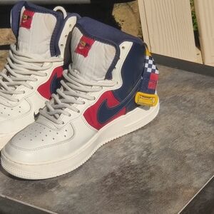 Nike High-Top Sneakers with Red and Blue Accents